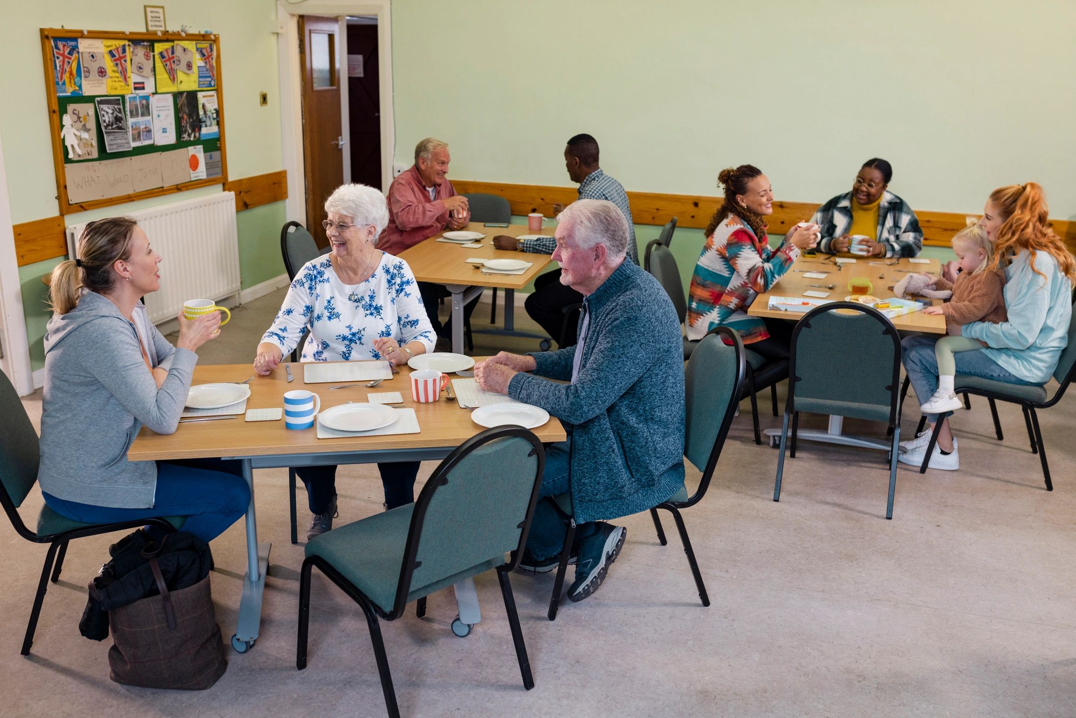 People gathering together in a warm community setting