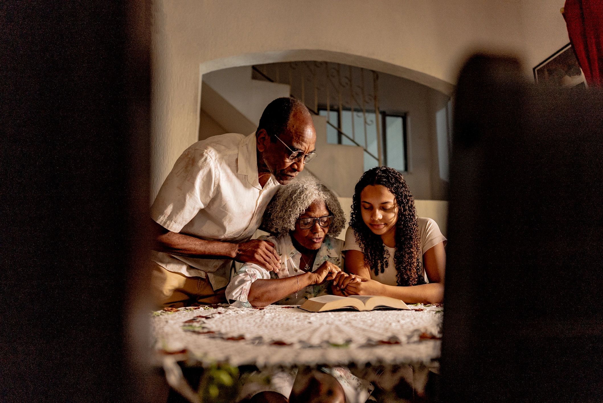 People reading together in a warm community setting