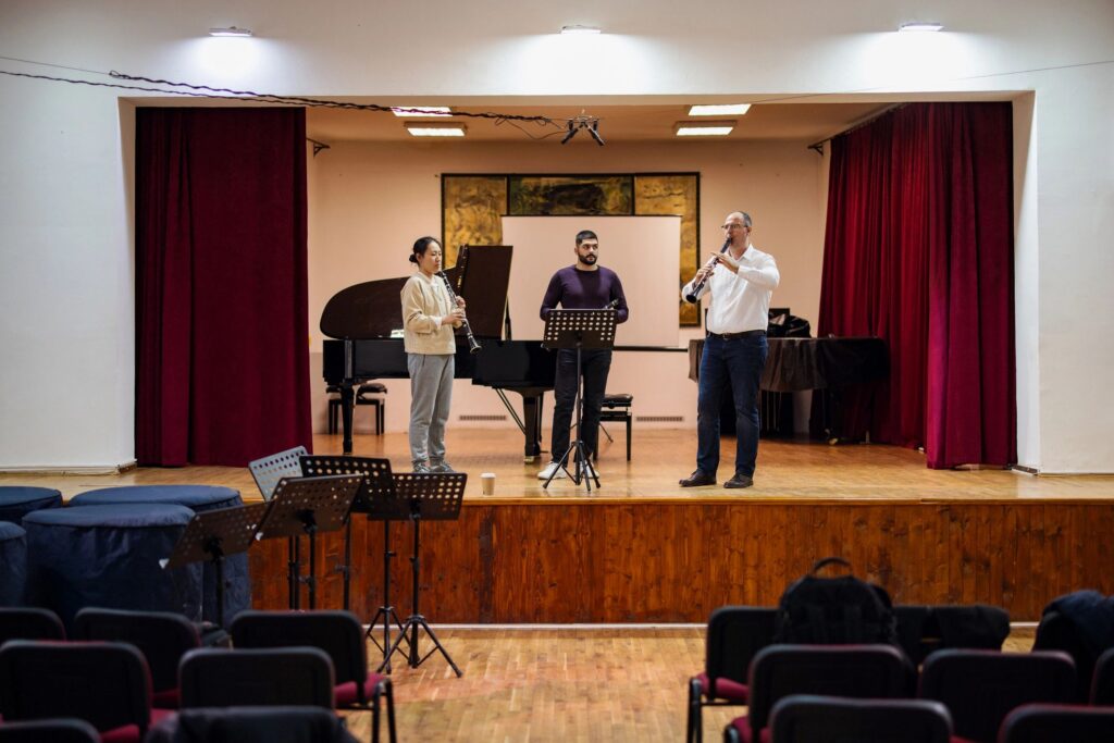 Clarinet Lesson Featuring Diverse Students and Instructor